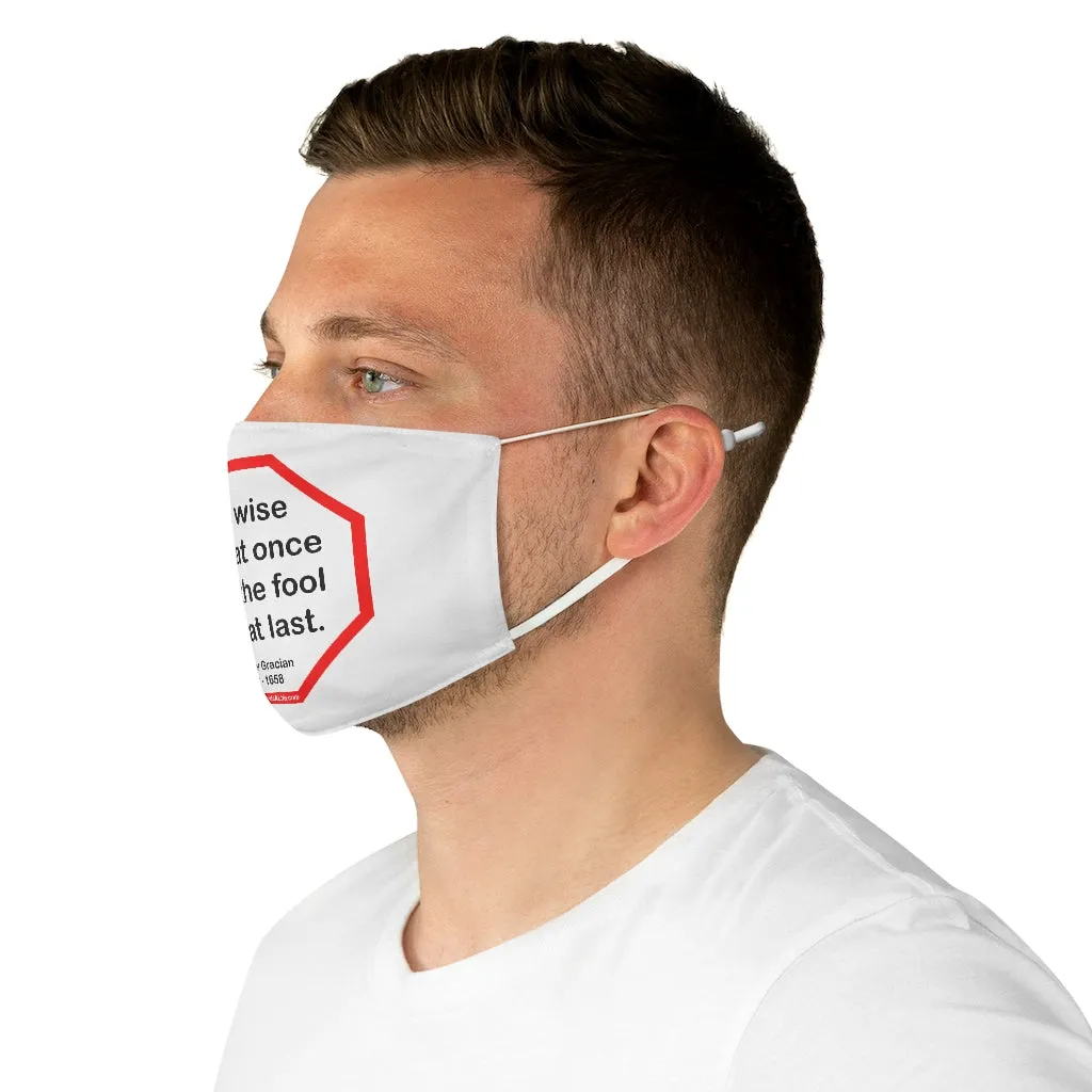 The wise does at once what the fool does at last.  -  Baltasar Gracian  1601 - 1658  - B4Uspeak Make a Statement Fabric Face Mask wht